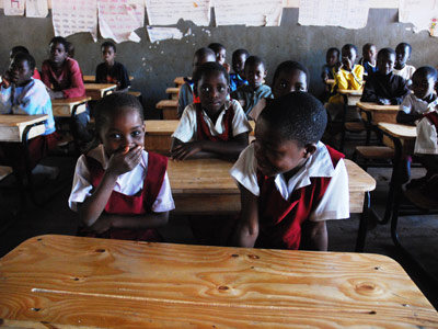 Children in Malawi seated at their new desks. (msnbc/UNICEF)