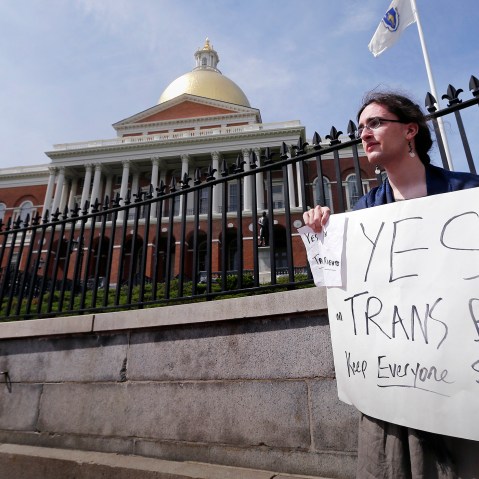 Asa Goodwillie, of Watertown, Mass., who is transgender, protests outside the Statehouse in Boston, June 1, 2016. (Photo by Charles Krupa/AP)
