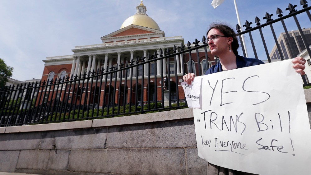 Asa Goodwillie, of Watertown, Mass., who is transgender, protests outside the Statehouse in Boston, June 1, 2016. (Photo by Charles Krupa/AP)