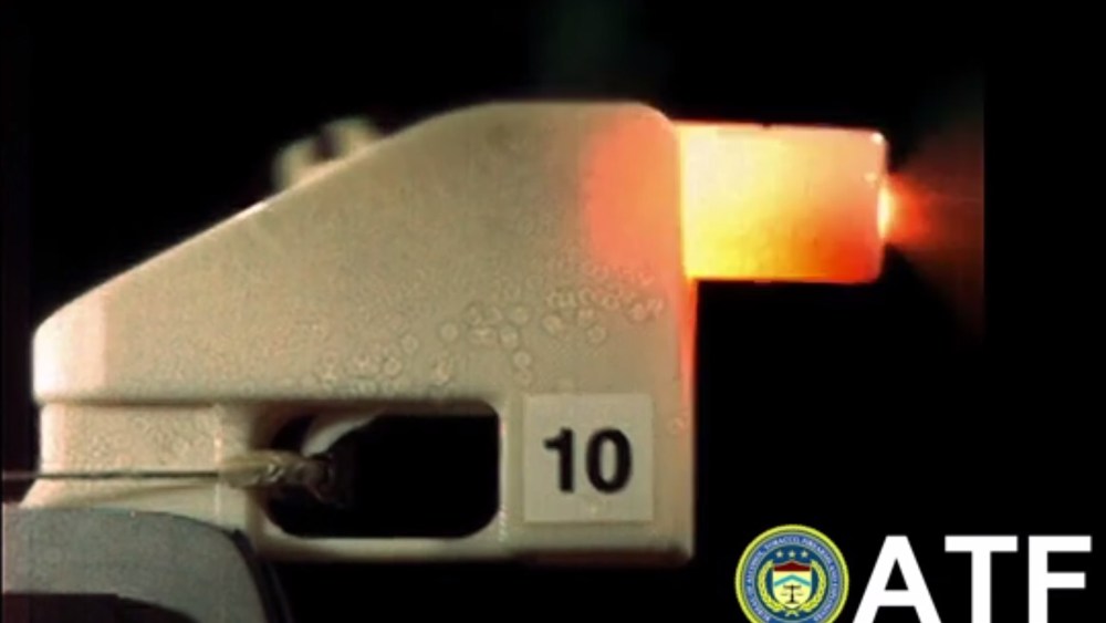 A frame from the U.S. Bureau of Alcohol, Tobacco, and Firearms' YouTube video of their 3D printed plastic gun being fired.