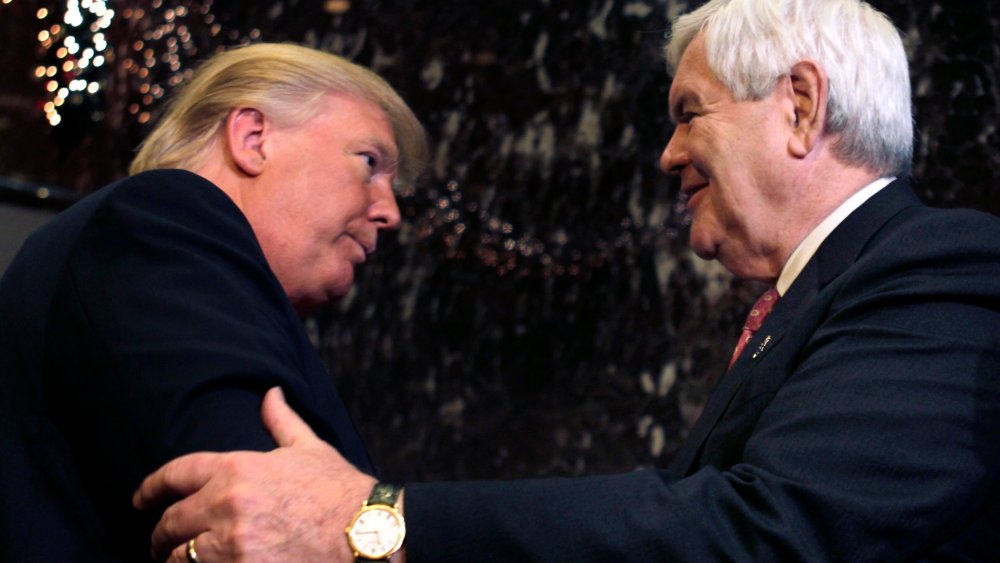 Republican presidential candidate, former House Speaker Newt Gingrich and Donald Trump shake hands after they met and spoke to the media in New York, Monday, Dec. 5, 2011.