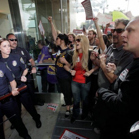 Student demonstrators are confronted by California State University Police officers during a protest Wednesday Nov. 16, 2011