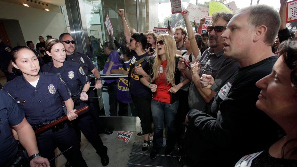 Student demonstrators are confronted by California State University Police officers during a protest Wednesday Nov. 16, 2011