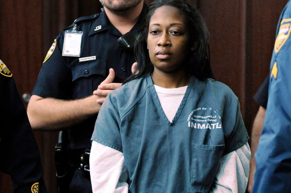 Marissa Alexander enters the courtroom for her bond hearing Wednesday, Nov. 13, 2013, in Jacksonville, Fla.
