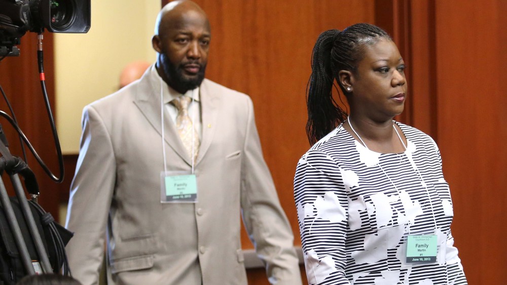 Tracy Martin, left, and Sybrina Fulton, parents of Trayvon Martin, arrive in court for the first day of the trial of George Zimmerman, in Seminole circuit court in Sanford, Fla., on June 10, 2013. (AP Photo/Orlando Sentinel, Joe Burbank/Pool)