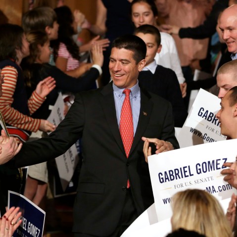 Republican candidate for the U.S. Senate, Gabriel Gomez, center, celebrates with supporters as he makes his way to the stage to address an audience with a victory speech at a watch party, in Cohasset, Mass. (AP Photo by Steven Senne/AP)