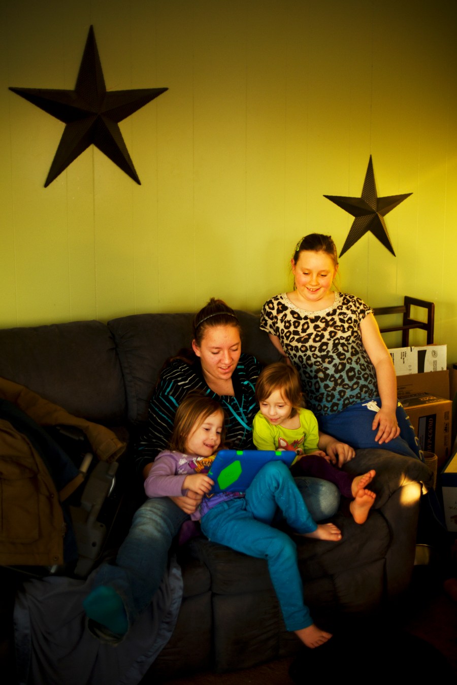 Kaitlynn, Hailey, Reagan, and Riley Moody watch a movie together.