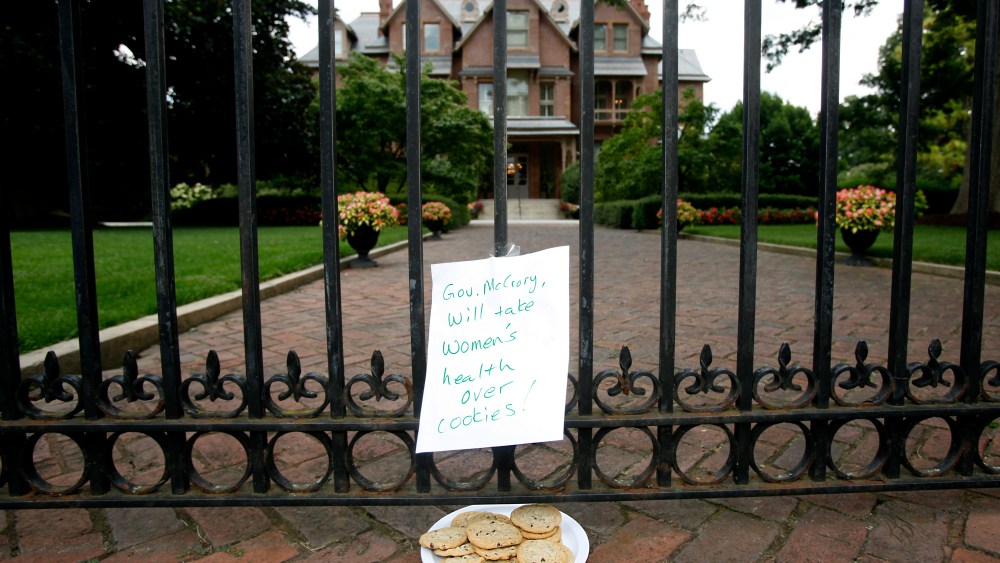 Opponents of the abortion bill that Gov. Pat McCrory signed on Monday continued their second day of protests across the street from the Executive Mansion on Tuesday, July 30, 2013. Just after 1pm, the Governor himself walked across the street to give...