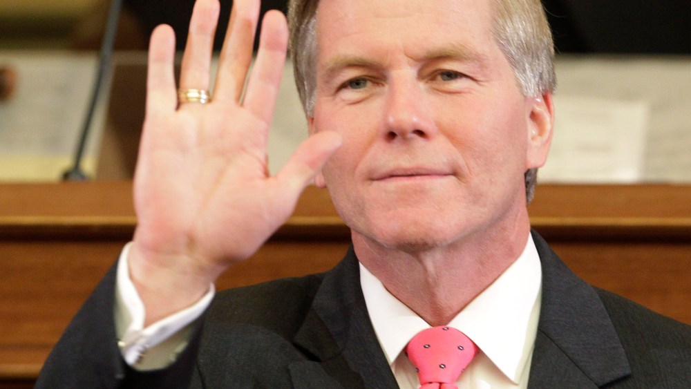 Virginia Gov. Bob McDonnell waves to his wife as he delivers his State of the Commonwealth address before a joint session of the 2013 Virginia General Assembly in the House chambers at the Capitol, Wednesday, Jan. 9, 2013 in Richmond, Va. (Photo by...