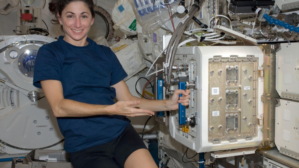 NASA astronaut Nicole Stott, Expedition 20/21 flight engineer, is pictured near the Mice Drawer System (MDS) in the Kibo laboratory of the International Space Station.