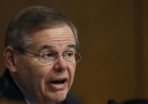 U.S. Senator Bob Menendez (D-NJ) listens during Federal Reserve Board Chairman Ben Bernanke's appearance before a committee hearing on "The Semiannual Monetary Policy Report to the Congress." in Washington February 26, 2013. REUTERS/Gary Cameron ...
