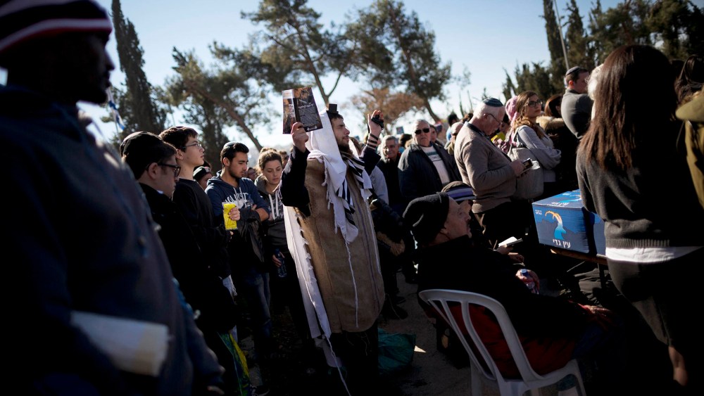 Israelis, mostly french Jews, attend the funeral of four victims of an attack on a kosher grocery store in Paris last week, in Jerusalem, on Jan. 13, 2015.