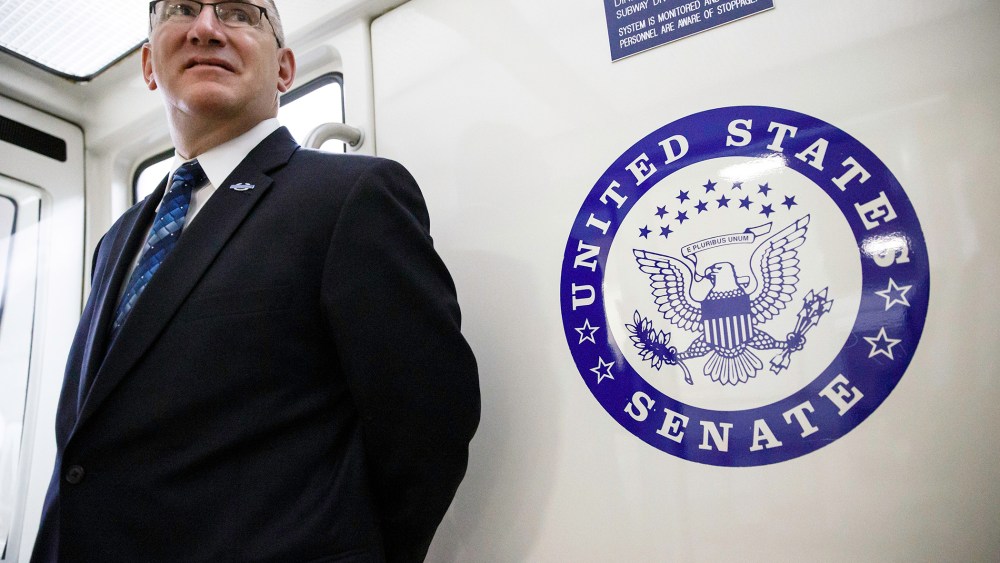 After finishing with a series of votes, Sen. John Walsh, D-Mont., leaves the Capitol to monitor the primary race back home in Montana, Tuesday, June 3, 2014, in Washington.