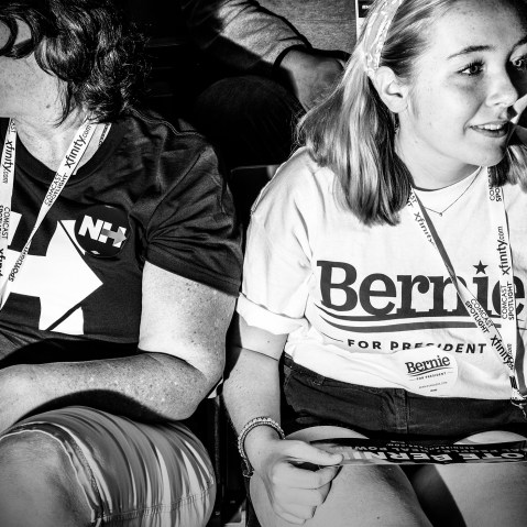 Supporters of rival democratic presidential candidates discuss their excitement before the start of the New Hampshire Democratic Convention in Manchester, N.H., Sept. 19, 2015. (Photo by Mark Peterson for MSNBC)