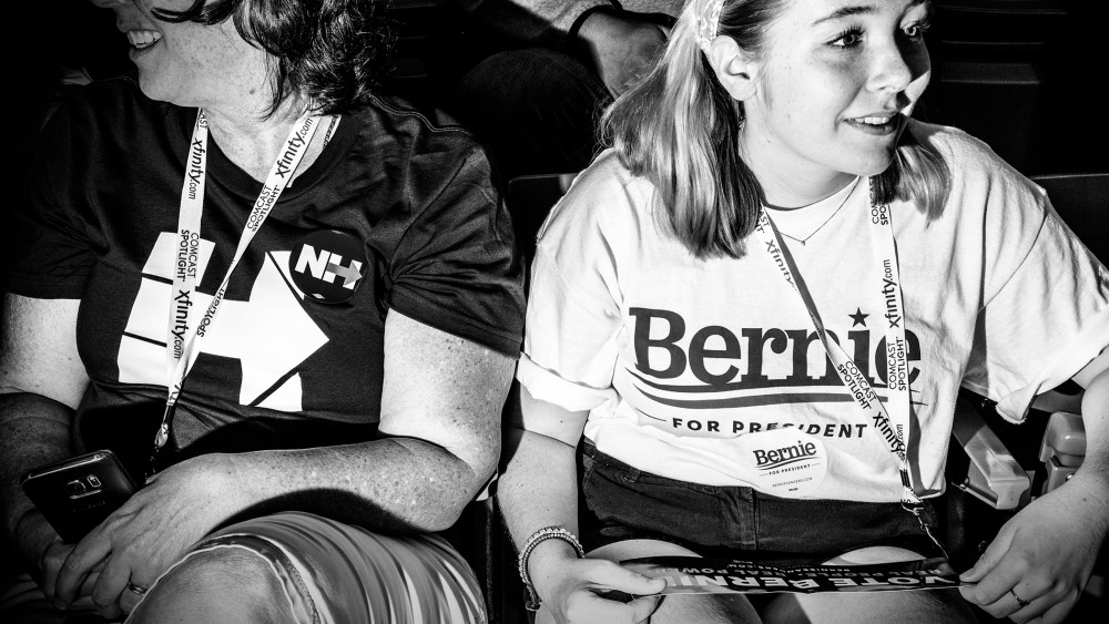 Supporters of rival democratic presidential candidates discuss their excitement before the start of the New Hampshire Democratic Convention in Manchester, N.H., Sept. 19, 2015. (Photo by Mark Peterson for MSNBC)