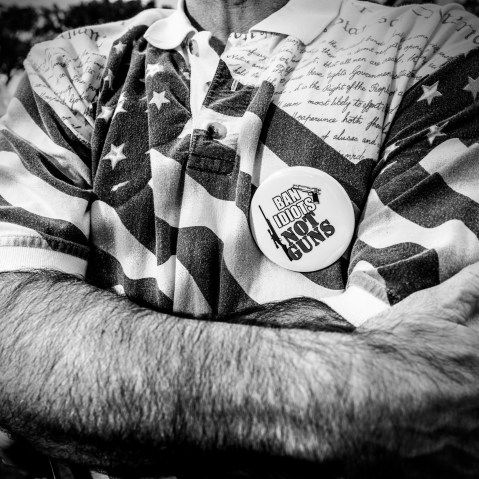 A supporter of Donald Trump wearing a "Ban idiots, not guns" button at a rally in Boca Raton, Fl. (Photo by Mark Peterson/Redux for MSNBC)