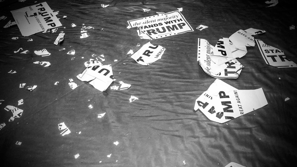 Ripped Donald Trump signs lay on the floor at a rally in Radford, Va., Feb. 29, 2016. (Photo by Mark Peterson/Redux for MSNBC)