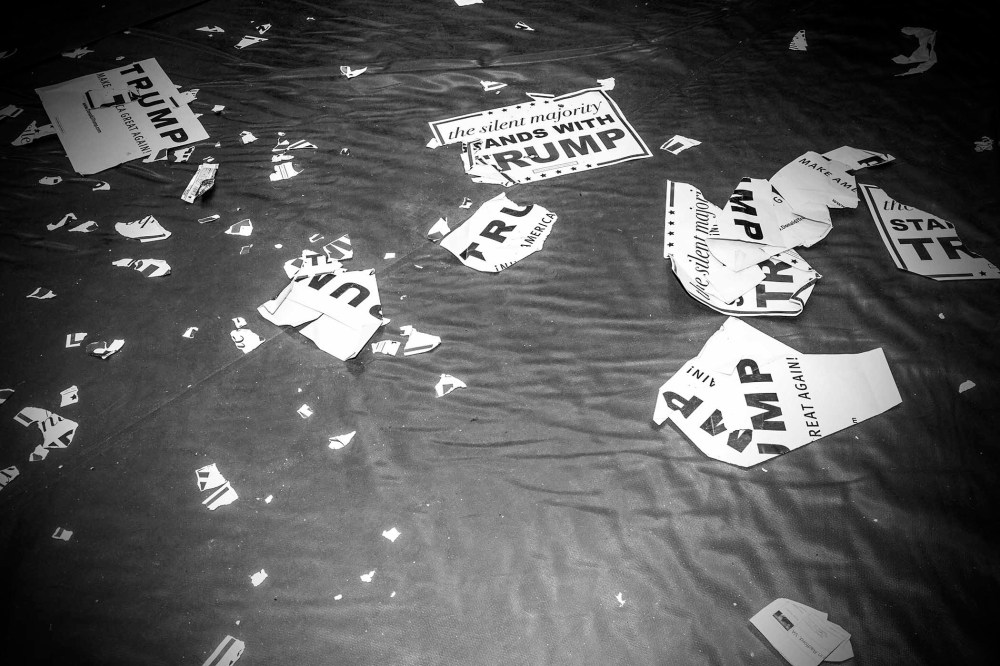 Ripped Donald Trump signs lay on the floor at a rally in Radford, Va., Feb. 29, 2016. (Photo by Mark Peterson/Redux for MSNBC)