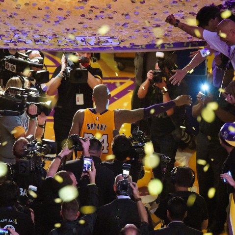 Los Angeles Lakers forward Kobe Bryant walks off the court after finishing his last NBA basketball game before retirement, against the Utah Jazz on April 13, 2016, in Los Angeles. (Photo by Mark J. Terrill/AP)