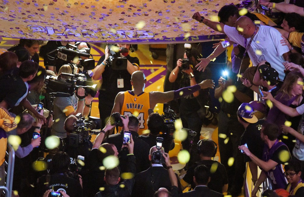 Los Angeles Lakers forward Kobe Bryant walks off the court after finishing his last NBA basketball game before retirement, against the Utah Jazz on April 13, 2016, in Los Angeles. (Photo by Mark J. Terrill/AP)