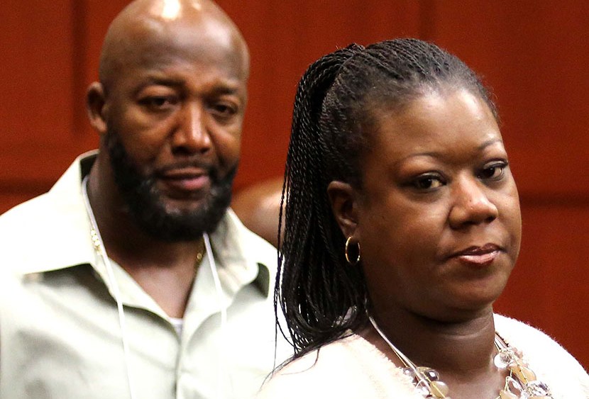 Sybrina Fulton, right, and Tracy Martin, parents of slain teen Trayvon Martin, arrive in Seminole circuit court for the George Zimmerman trial in Sanford, Fla., Monday, June 17, 2013.(Photo by Joe Burbank/Orlando Sentinel/AP)