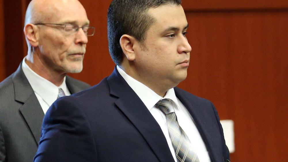 George Zimmerman arrives in circuit court for his trial, along with co-counsel Don West, Monday, June 10, 2013, in Sanford, Fla. (AP Photo/Orlando Sentinel, Joe Burbank)