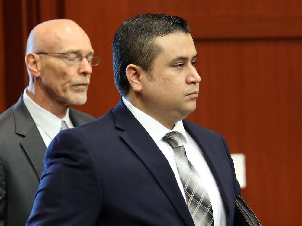 George Zimmerman arrives in circuit court for his trial, along with co-counsel Don West, Monday, June 10, 2013, in Sanford, Fla. (AP Photo/Orlando Sentinel, Joe Burbank)