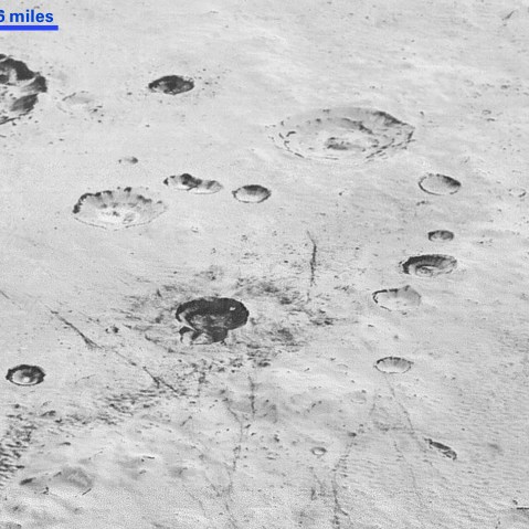 Layered Craters and Icy Plains on Pluto. This image from NASA’s New Horizons spacecraft reveals new details of Pluto’s rugged, icy cratered plains, including layering in the interior walls of many craters. (Photo by NASA/JHUAPL/SwRI)