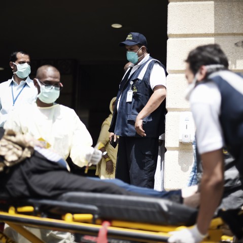 Saudi medics tend to injured pilgrims after they arrived at an emergency hospital following a deadly stampede in Mina, near the holy city of Mecca, on the first day of Eid al-Adha on Sept. 24, 2015. (Photo by Mohammed Al-Shaikh/AFP/Getty)
