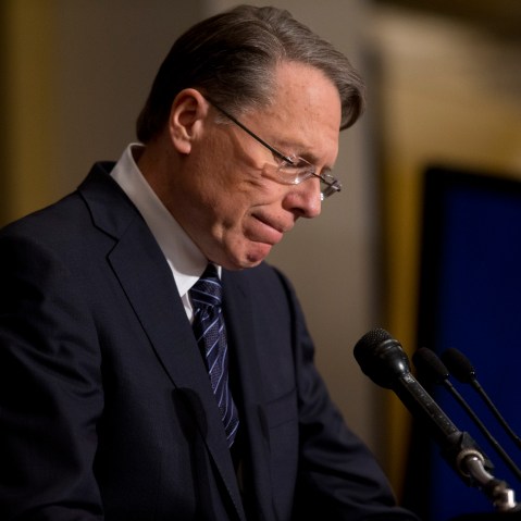 File Photo: National Rifle Association executive vice president Wayne LaPierre pauses as he makes a statement during a news conference in response to the Connecticut school shooting, on Friday, Dec. 21, 2012 (Photo by Evan Vucci/AP)