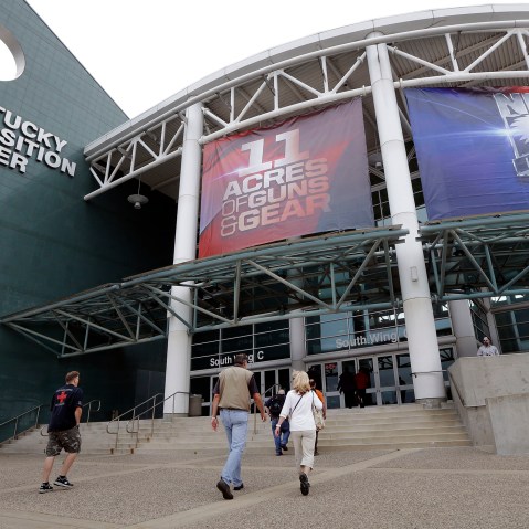 People arrive at the Kentucky Exposition Center in Louisville, Ky., May 20, 2016, for the the National Rifle Association convention. (Photo by Mark Humphrey/AP)