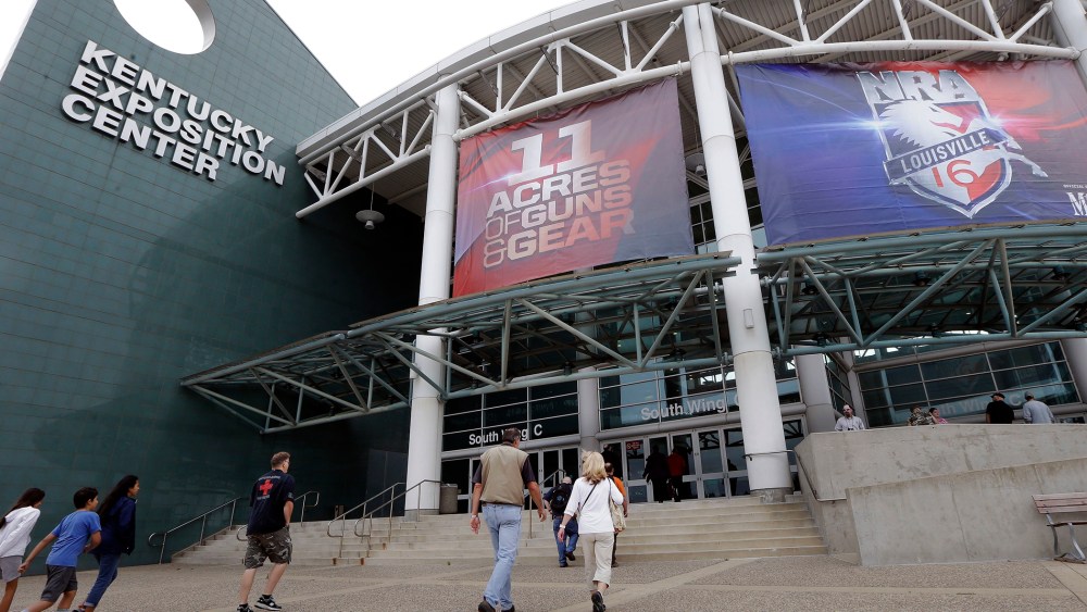People arrive at the Kentucky Exposition Center in Louisville, Ky., May 20, 2016, for the the National Rifle Association convention. (Photo by Mark Humphrey/AP)