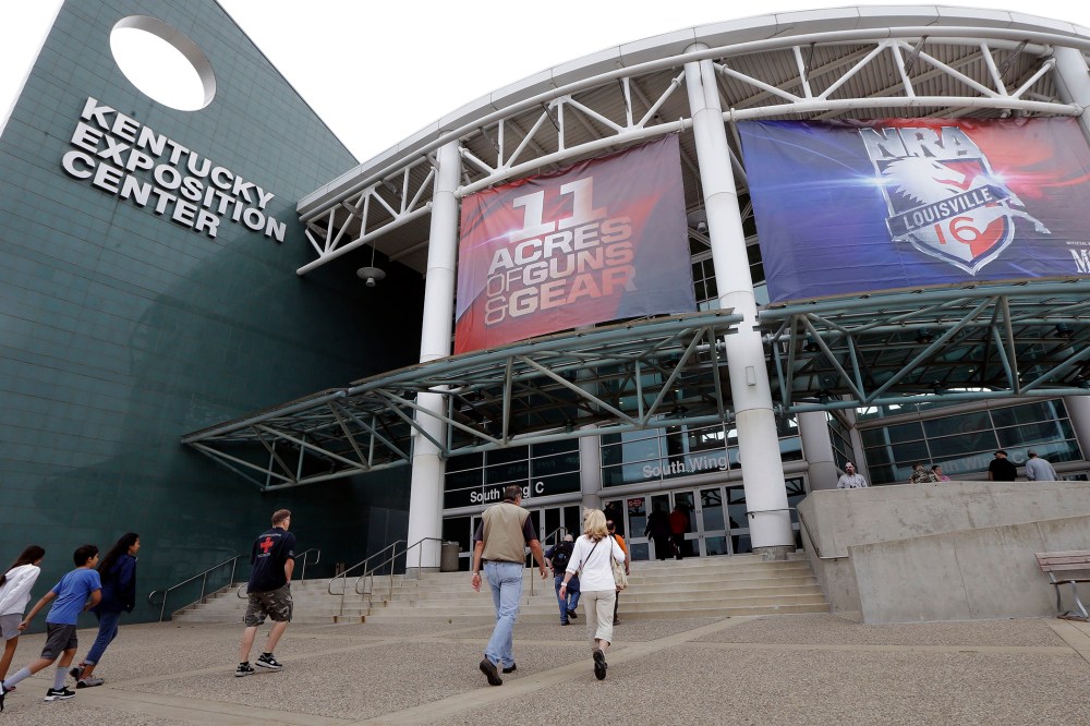 People arrive at the Kentucky Exposition Center in Louisville, Ky., May 20, 2016, for the the National Rifle Association convention. (Photo by Mark Humphrey/AP)
