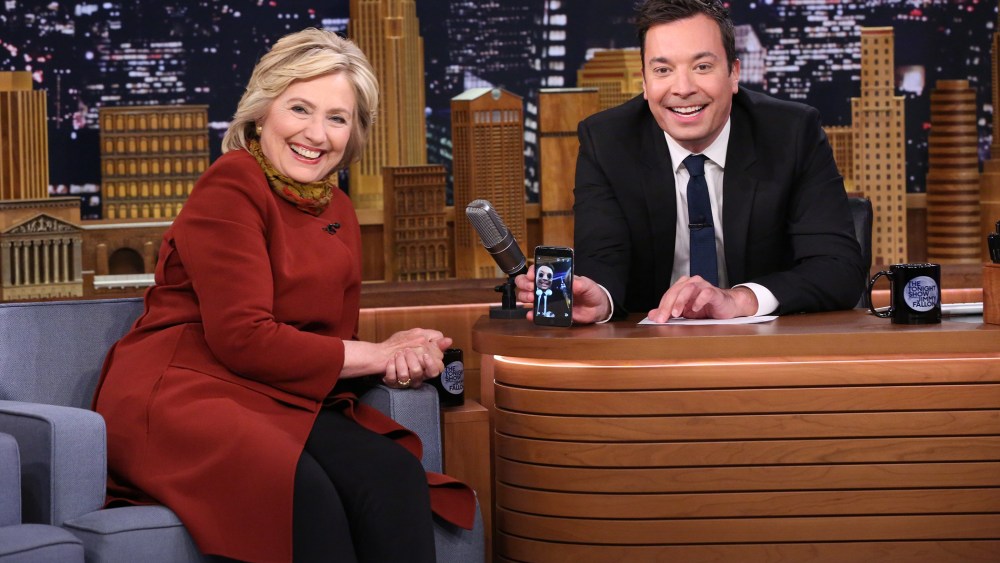 Presidential candidate Hillary Clinton shares a laugh with Jimmy Fallon as they take a Snapchat on Tonight Show, Jan. 14, 2016. (Photo by Douglas Gorenstein/NBC)