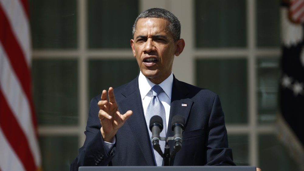 President Barack Obama speaks about his proposed 2014 budget as he stands with acting budget director Jeff Zients in the Rose Garden at the White House in Washington, Wednesday, April 10, 2013. (AP Photo/Charles Dharapak)