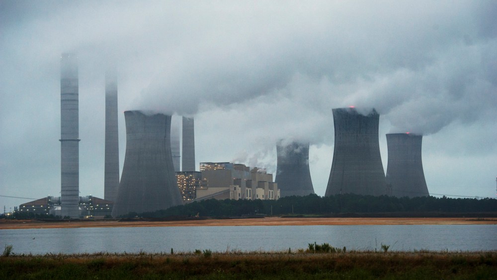 The coal-fired Plant Scherer is shown in operation early Sunday, June 1, 2014, in Juliette, Ga.