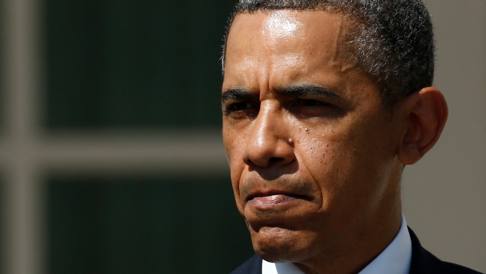 President Barack Obama pauses as he speaks about his proposed 2014 budget as he stands with acting budget director Jeff Zients in the Rose Garden at the White House in Washington, Wednesday, April 10, 2013. (AP Photo/Charles Dharapak)