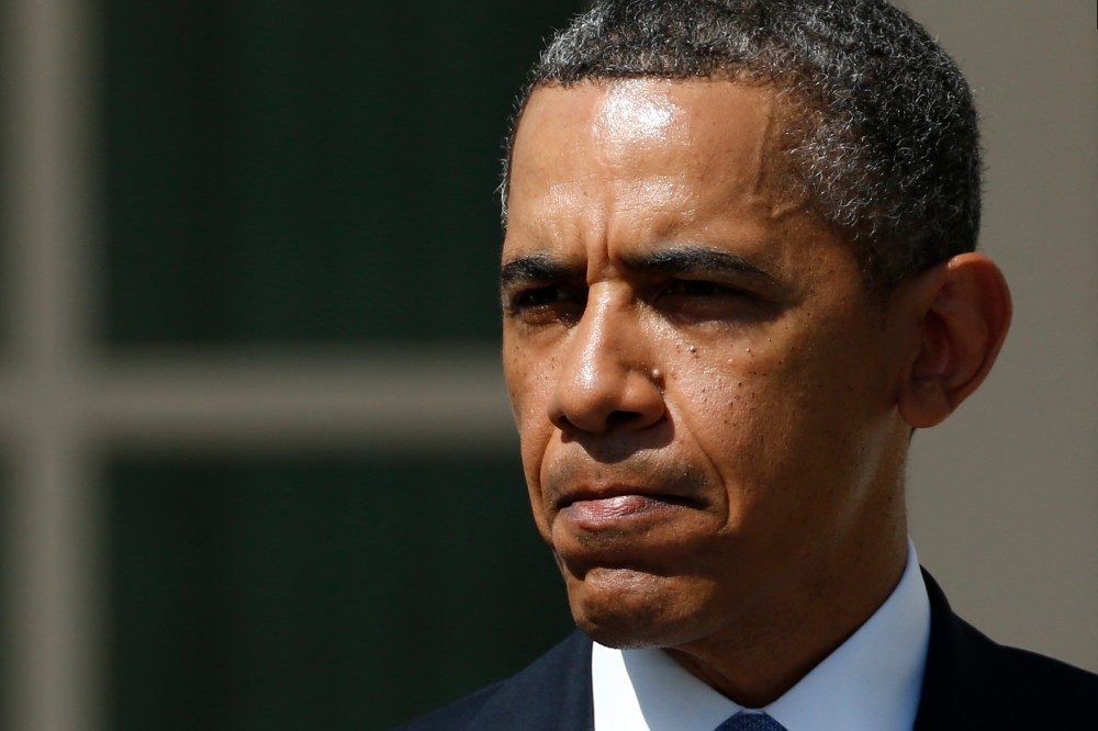 President Barack Obama pauses as he speaks about his proposed 2014 budget as he stands with acting budget director Jeff Zients in the Rose Garden at the White House in Washington, Wednesday, April 10, 2013. (AP Photo/Charles Dharapak)