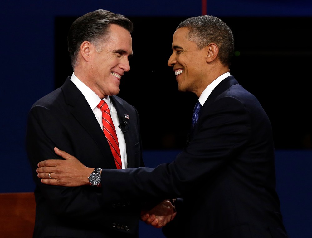 Republican presidential nominee Mitt Romney  and President Barack Obama shake hands during the first presidential debate at the University of Denver, Wednesday, Oct. 3, 2012, in Denver. (Photo: AP/Charlie Neibergall)