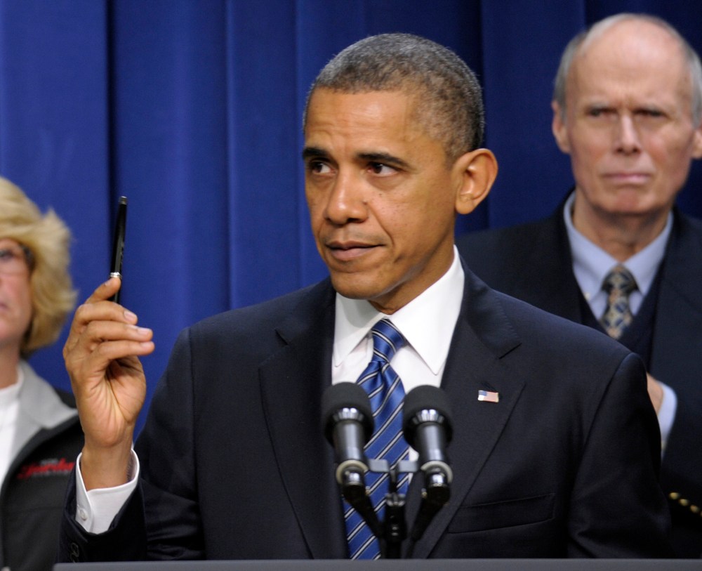President Barack Obama gestures as he speaks in the Eisenhower Executive Office Building, on the White House campus in Washington, Wednesday (AP Photo/Susan Walsh)