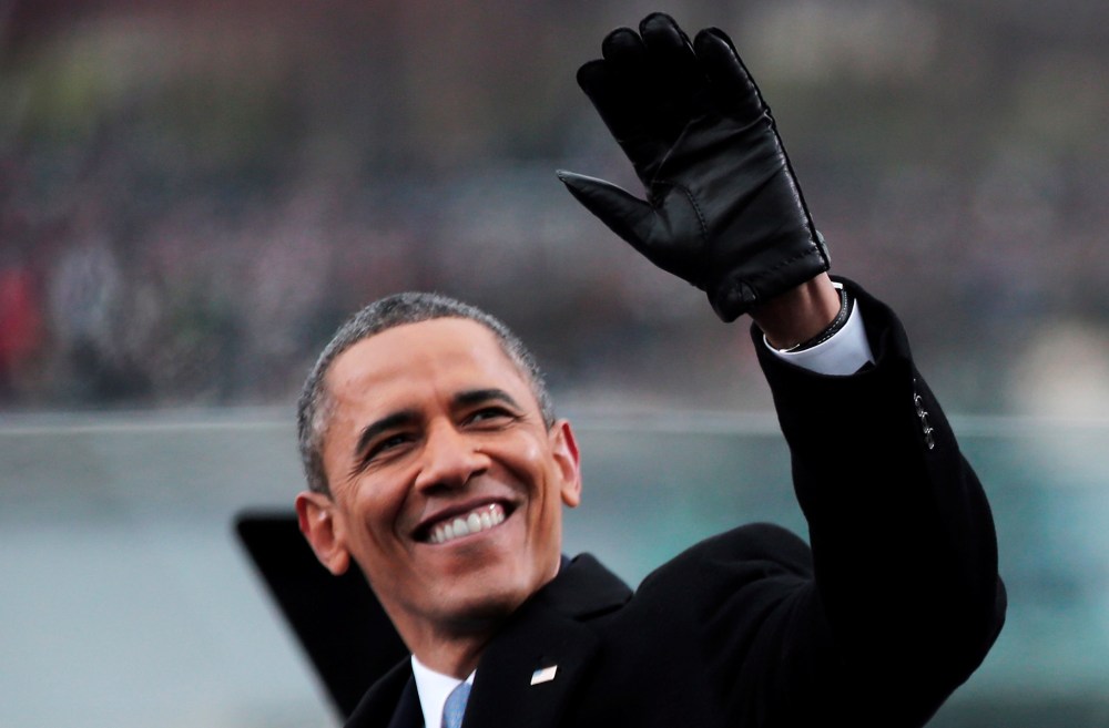 U.S. President Barack Obama waves during the presidential inauguration on the West Front of the U.S. Capitol January 21, 2013 in Washington, DC. Barack Obama was re-elected for a second term as President of the United States....