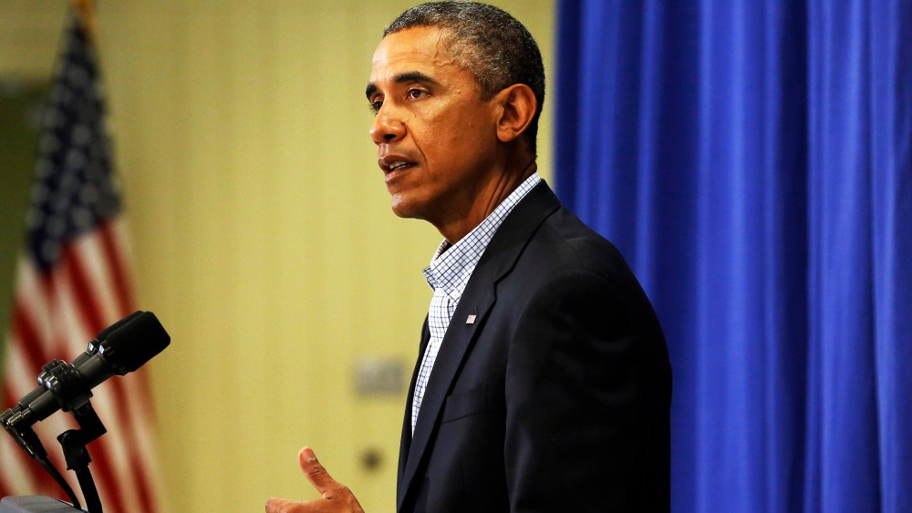 President Barack Obama speaks to reporters, Aug. 14, 2014, about the police shooting of 18-year-old Michael Brown, in Ferguson, Mo.