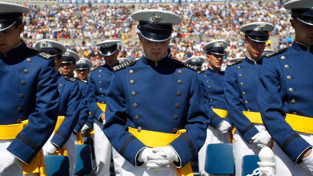 U.S. Air Force Academy Cadets of the Class of 2012, lower their heads during the Invocation at the start of the commencement ceremony, Wednesday, May 23, 2012, in Colorado Springs, Colo.