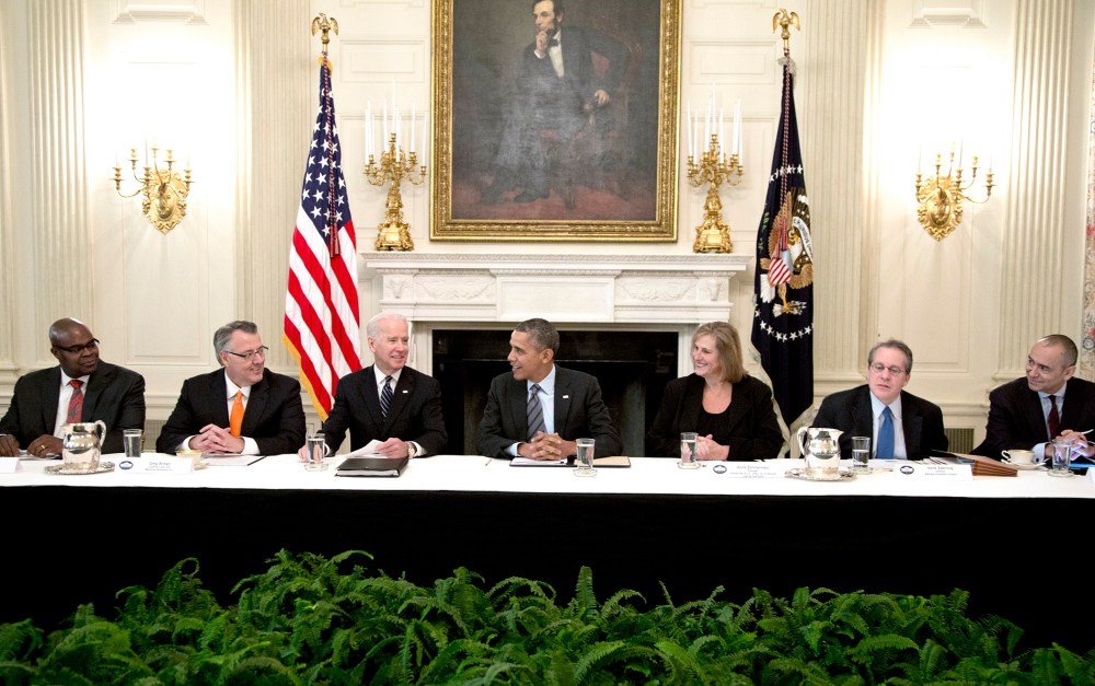 President Barack Obama, Vice President Joe Biden and business leaders meet in the State Dining Room of the White House on Jan. 31, 2014.