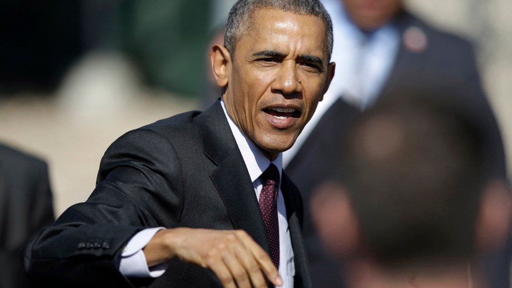 President Barack Obama leaves after speaking about clean-energy jobs, on April 3, 2015, at Hill Air Force Base, Utah. (Photo by Rick Bowmer/AP)