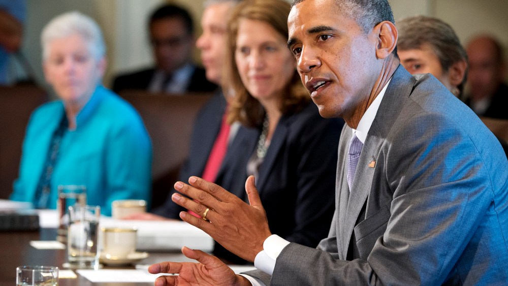 President Barack Obama speaks to the media during a meeting with his cabinet members, July 1, 2014.