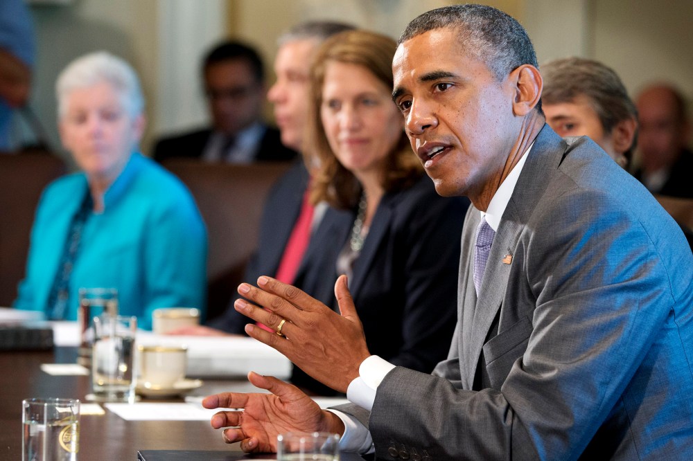 President Barack Obama speaks to the media during a meeting with his cabinet members, July 1, 2014.