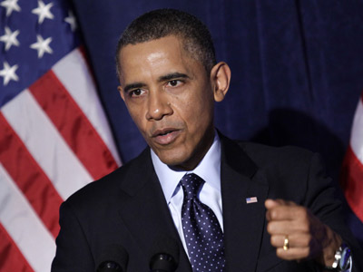 President Obama delivers remarks at the Organizing for Action dinner in Washington on March 13, 2013 (Photo by Yuri Gripas/Reuters)