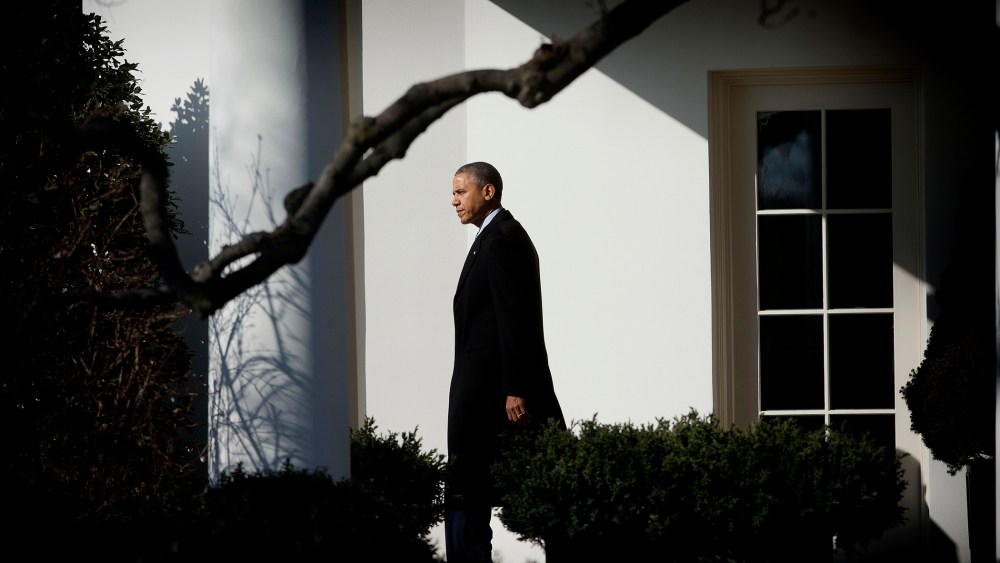 President Barack Obama walks out of the Oval Office of the White House in Washington, Feb. 7, 2014.