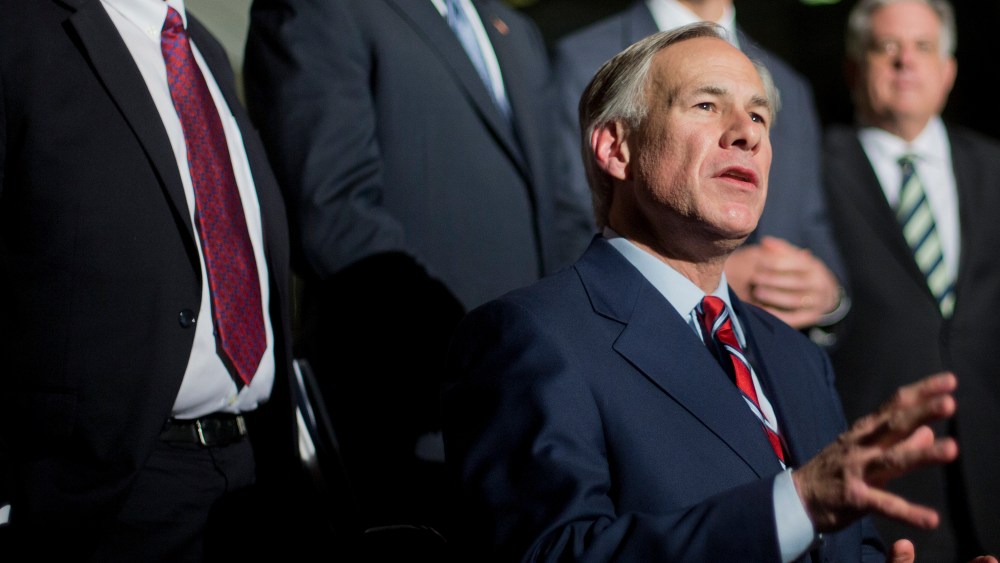 Texas Gov.-elect Greg Abbott speaks to member of the media following a meeting with President Barack Obama and newly elected governors at the White House on Dec. 5, 2014. (Pablo Martinez Monsivais/AP)